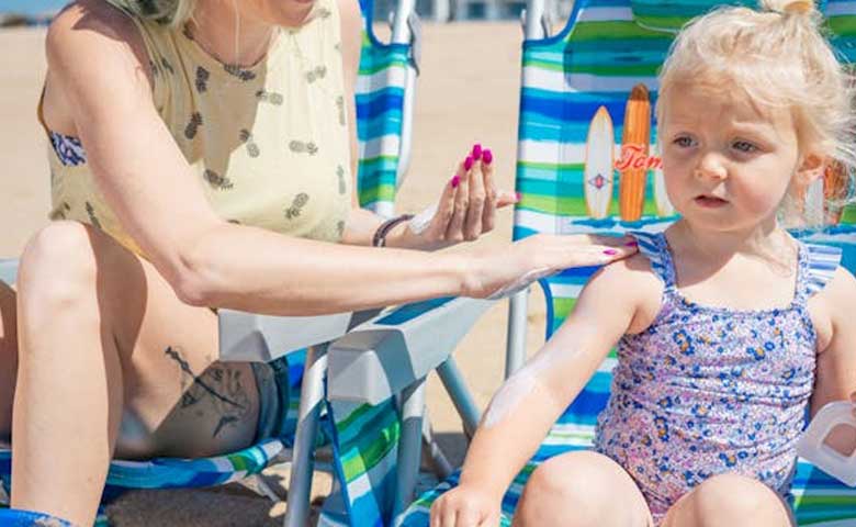 Applying Sunscreen on Infant